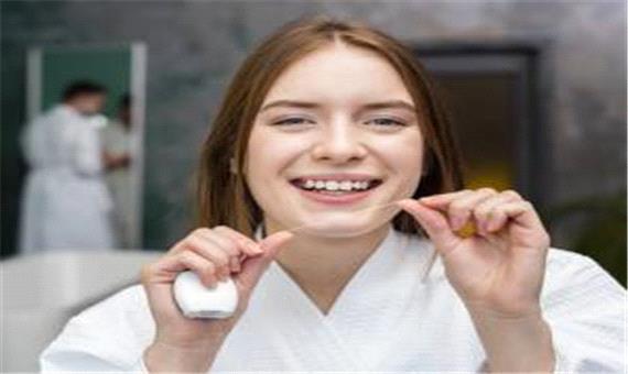 بهترین زمان و روش استفاده از نخ دندان
