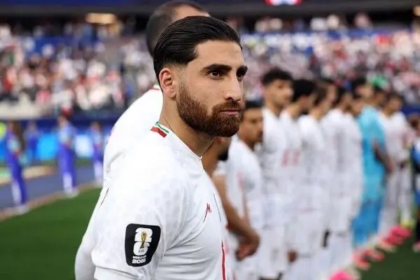 واکنش متحد بازیکنان ایران هنگام سرود ملی سوژه رسانه انگلیسی شد